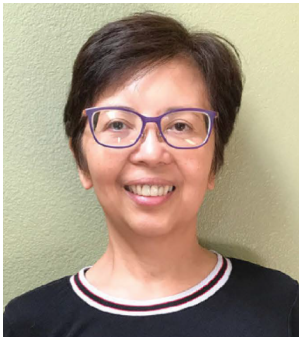 Smiling woman with short hair and glasses